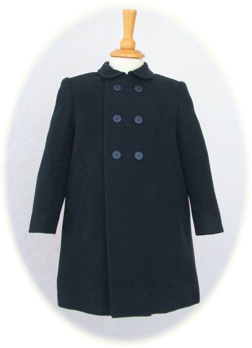 Child's traditional coats in navy blue with quilted lining. From Ancar.