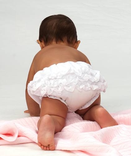 Baby's frilly knickers in ivory, white or pink in sizes from birth to 2  years.