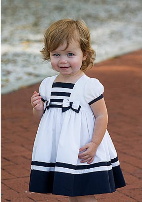 Little girl's sailor dress from Sarah Louise. In sizes 3